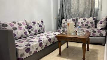 Suite Deluxe | Área de sala de estar