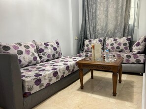 Suite Deluxe | Área de sala de estar