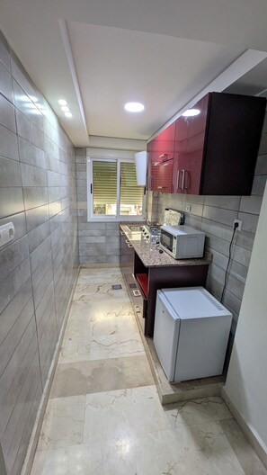 Family Apartment, Housekeeping, City View | Bathroom | Shower, towels, soap, shampoo