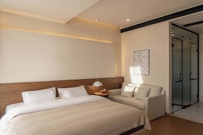 Family Suite, Ocean View | Desk, laptop workspace, blackout drapes, soundproofing