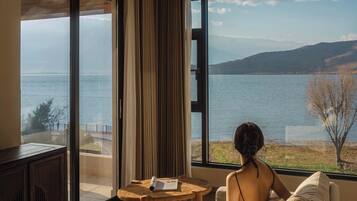 Desk, laptop workspace, blackout drapes, soundproofing