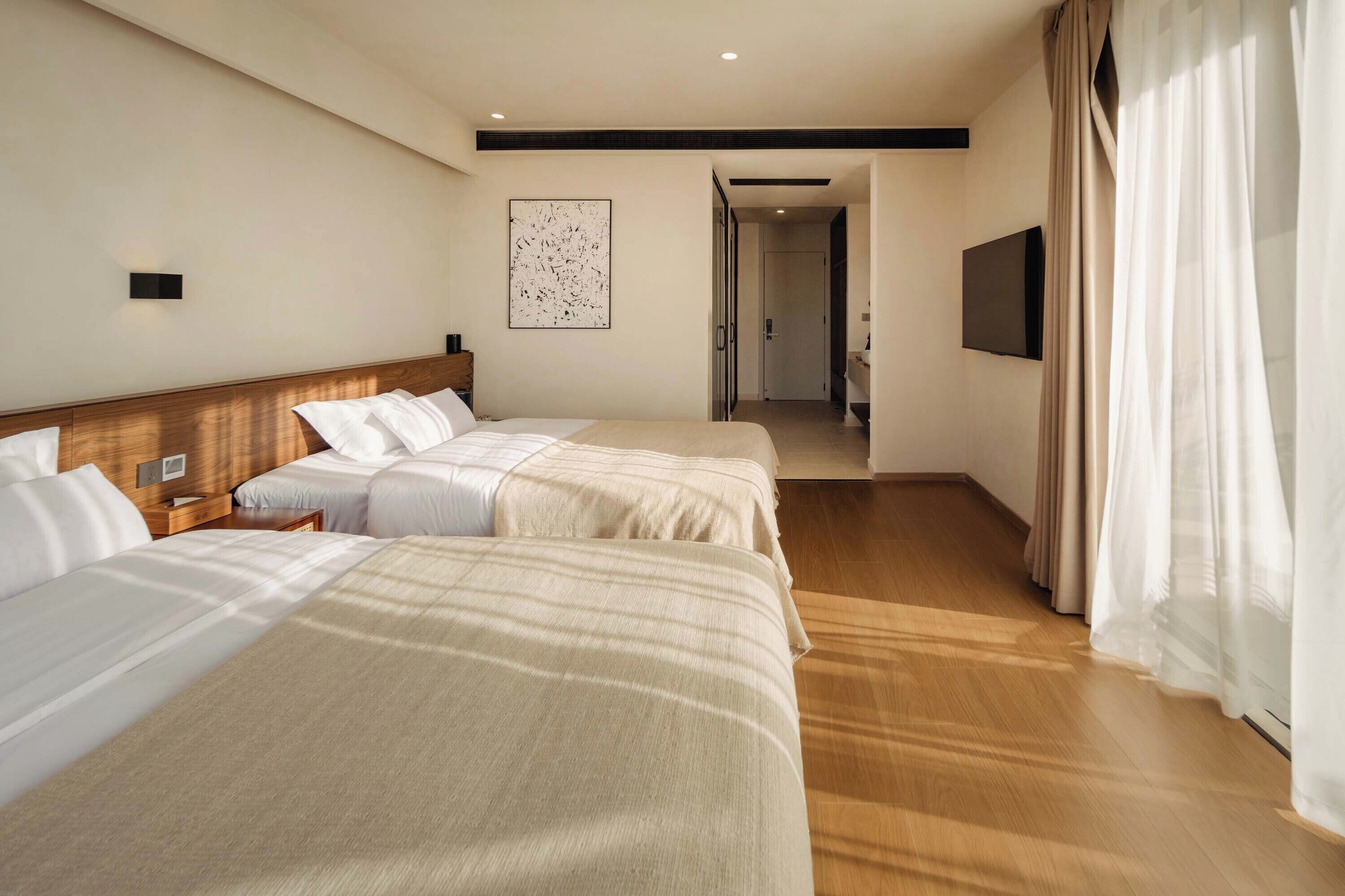 Perhehuone, valtamerinäköala | Työpöytä, kannettavalle tietokoneelle sopiva työtila, pimennysverhot