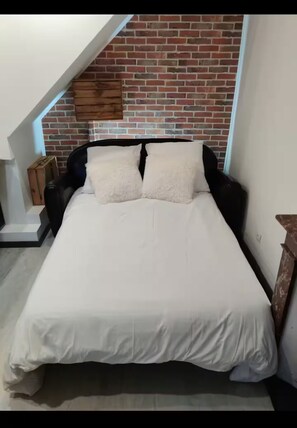 1 chambre, fer et planche Ă repasser, Wi-Fi, draps fournis