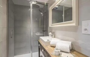 Hair dryer, towels, soap, toilet paper