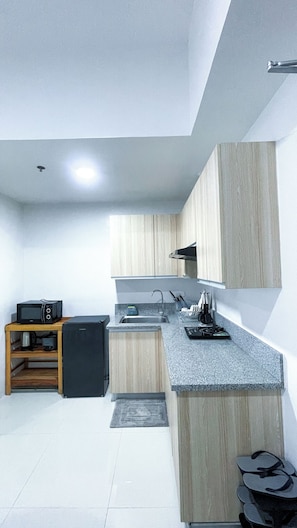 Shared Dormitory, 1 Bedroom, Balcony | Private kitchen - Room-refreshing Studio Escape With Home (Iloilo)