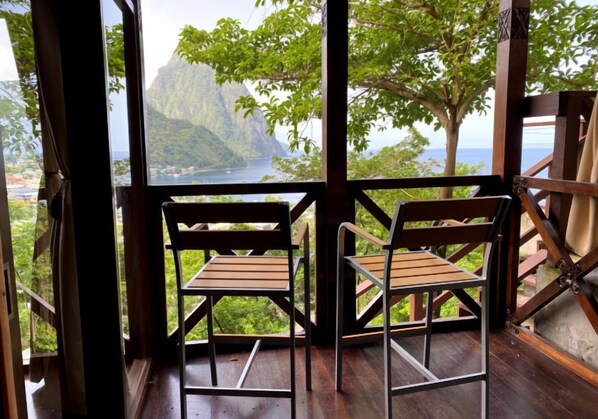 Lounge by the windows and watch the coastline glow.