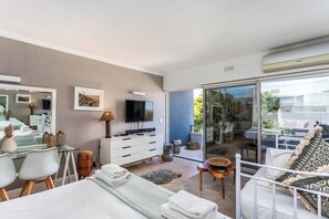 Deluxe Apartment, Balcony, Beach View | Iron/ironing board, free WiFi