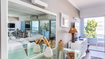 Deluxe Apartment, Balcony, Beach View | Living area