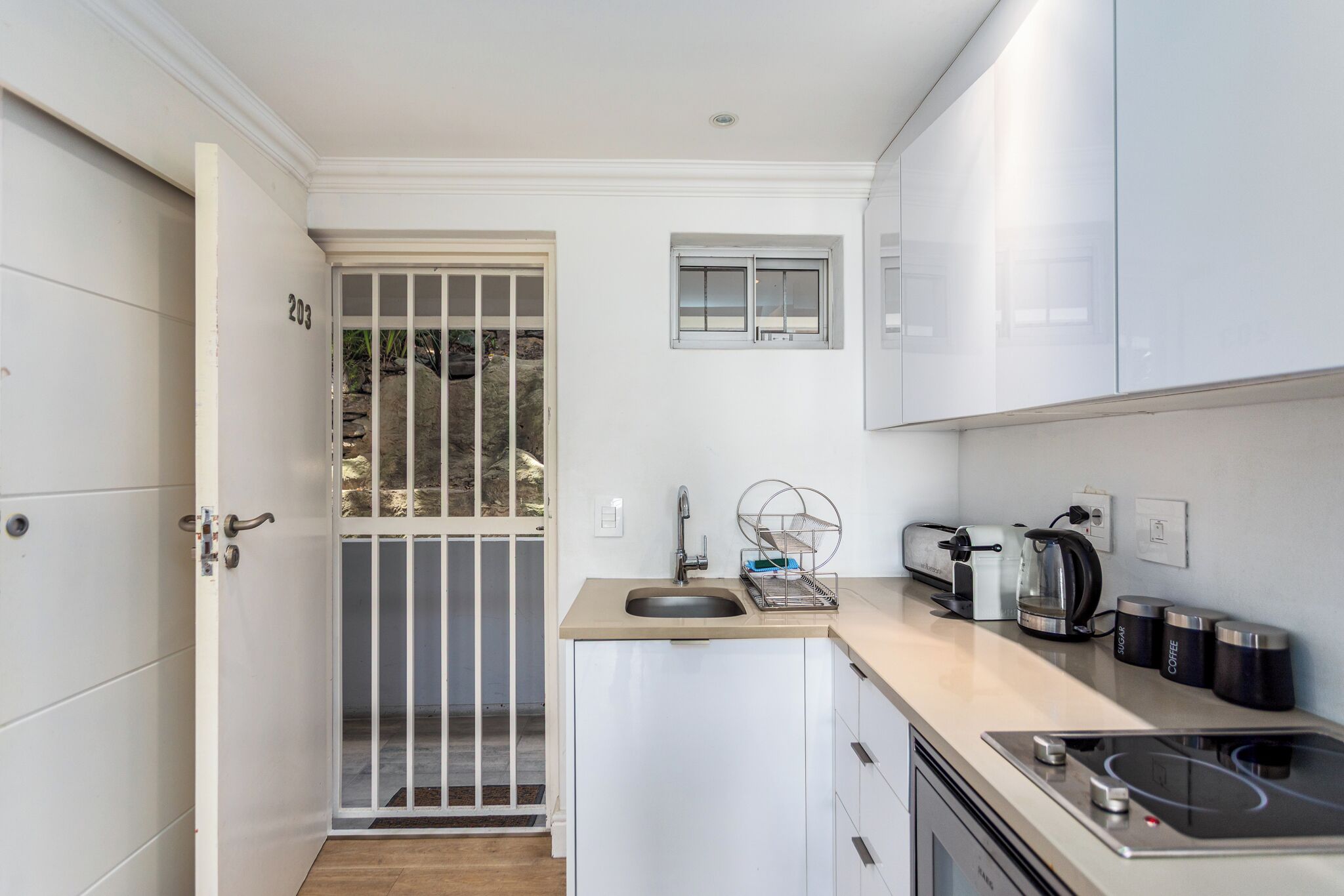 Deluxe Apartment, Balcony, Beach View | Private kitchen | Full-size fridge, microwave, oven, stovetop