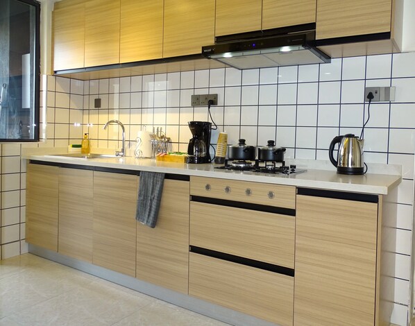 Fridge, microwave, stovetop, coffee/tea maker