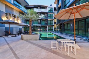 Appartement, 1 slaapkamer, toegankelijk voor mindervaliden, balkon | Zwembad | Een buitenzwembad