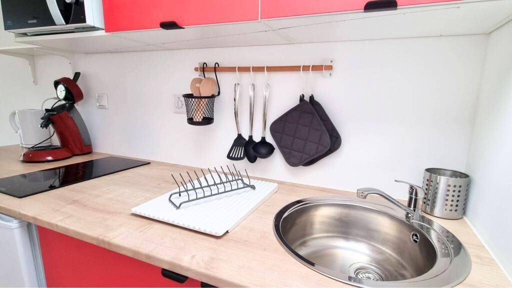 Fridge, microwave, stovetop, coffee/tea maker