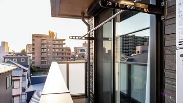 Apartment, Lanai, City View | Blackout curtains, soundproofing, iron/ironing board, free WiFi