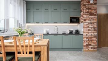 Apartment (57) | Private kitchen | Fridge, stovetop, electric kettle, cookware/dishes/utensils