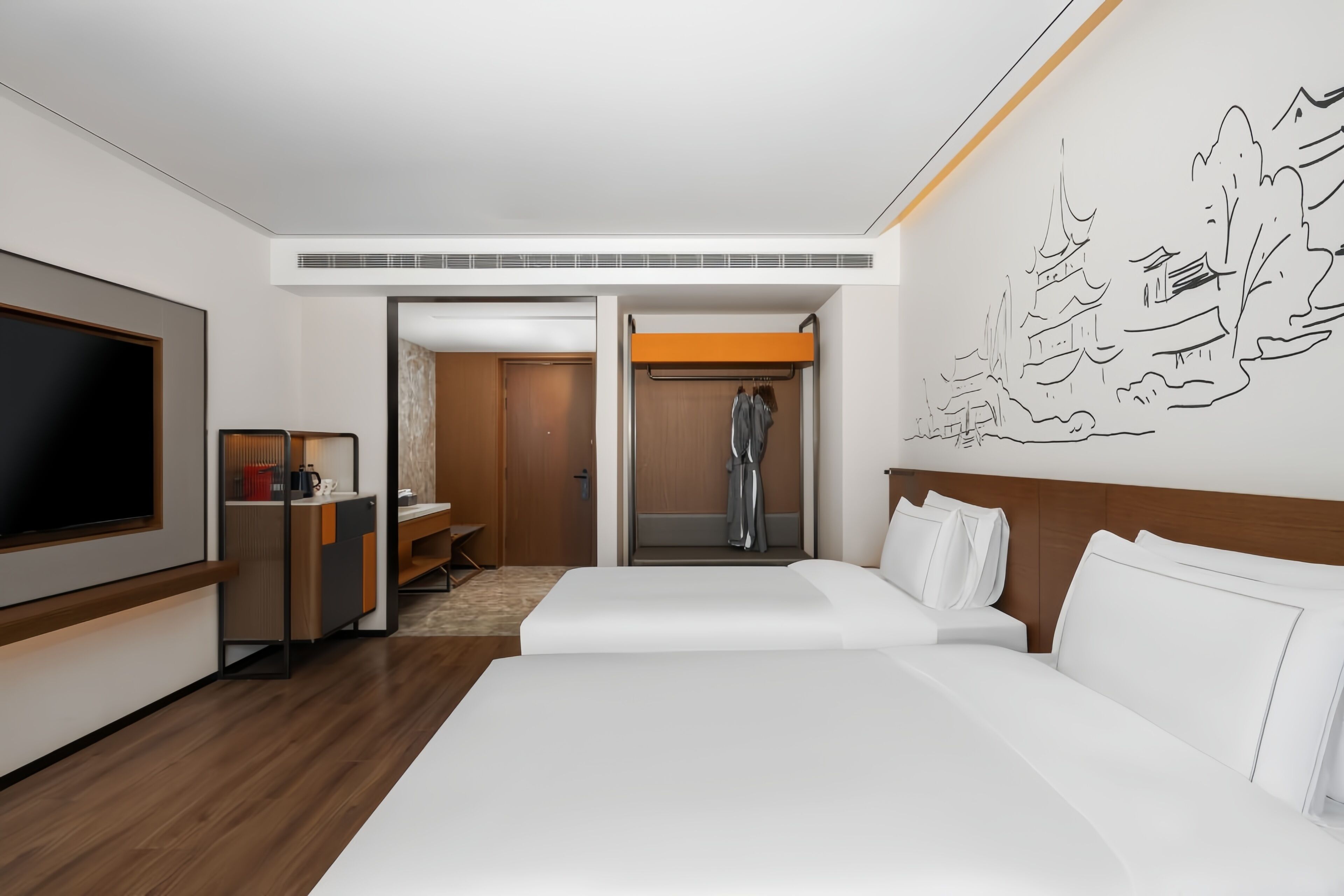 A hotel room with a large bed, a TV, a desk, and a bathroom with a shower.
