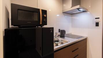 Suíte estúdio luxo | Wi-Fi de cortesia, roupa de cama