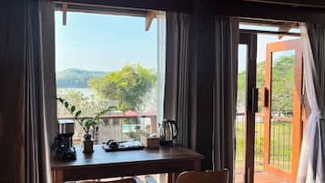 Suite, Lanai, River View | Free minibar items, in-room safe, desk, blackout drapes