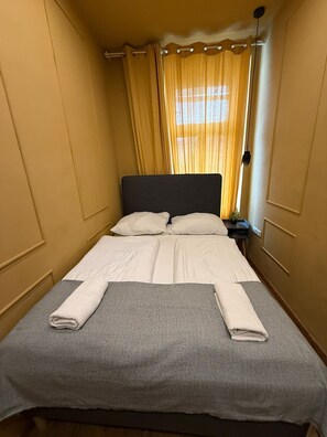 Apartamento básico | Ferros/tábuas de passar roupa, Wi-Fi de cortesia