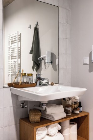 Shower, hair dryer, towels, soap