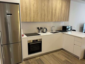 Fridge, microwave, oven, stovetop - Impressive 3BR Sunny Terrace in Chueca (Madrid)