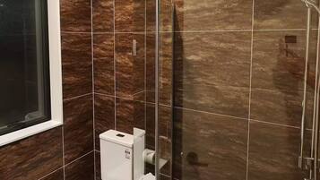 Shower, hair dryer, towels, soap