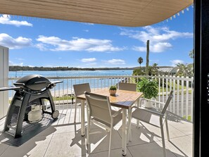 Apartment | Outdoor dining - Modern 1-bedroom Apt With Sweeping Water Views (Batemans Bay)