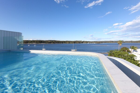 Apartment | Pool | Outdoor pool - Modern 1-bedroom Apt With Sweeping Water Views (Batemans Bay)