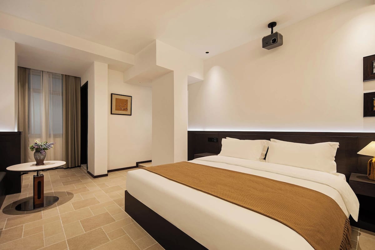 Economy Double Room, City View | Laptop workspace, blackout drapes, soundproofing, free WiFi