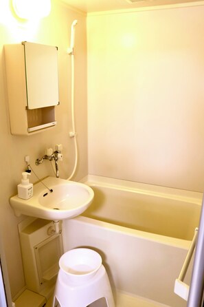 Hair dryer, bidet, towels, soap