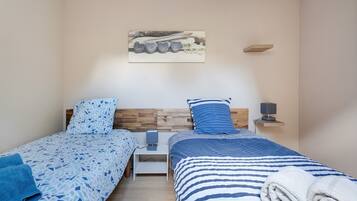 3 slaapkamers, een strijkplank/strijkijzer, wifi, beddengoed
