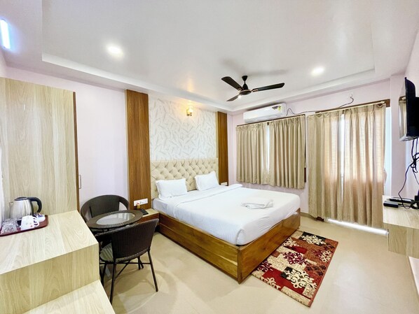 Premium bedding, desk, laptop workspace, free WiFi