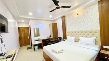Premium bedding, desk, laptop workspace, free WiFi