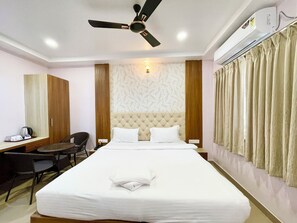 Premium bedding, desk, laptop workspace, free WiFi