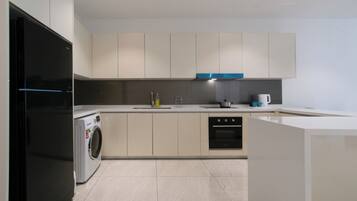 Luxury Suite, 3 Bedrooms, Balcony, City View | Private kitchen | Fridge, oven, stovetop, toaster oven