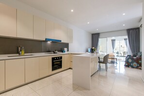 Luxury Suite, 3 Bedrooms, Balcony, City View | Private kitchen | Fridge, oven, stovetop, toaster oven