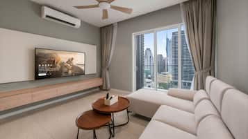 Deluxe Suite, 2 Bedrooms, Balcony, City View | Living area
