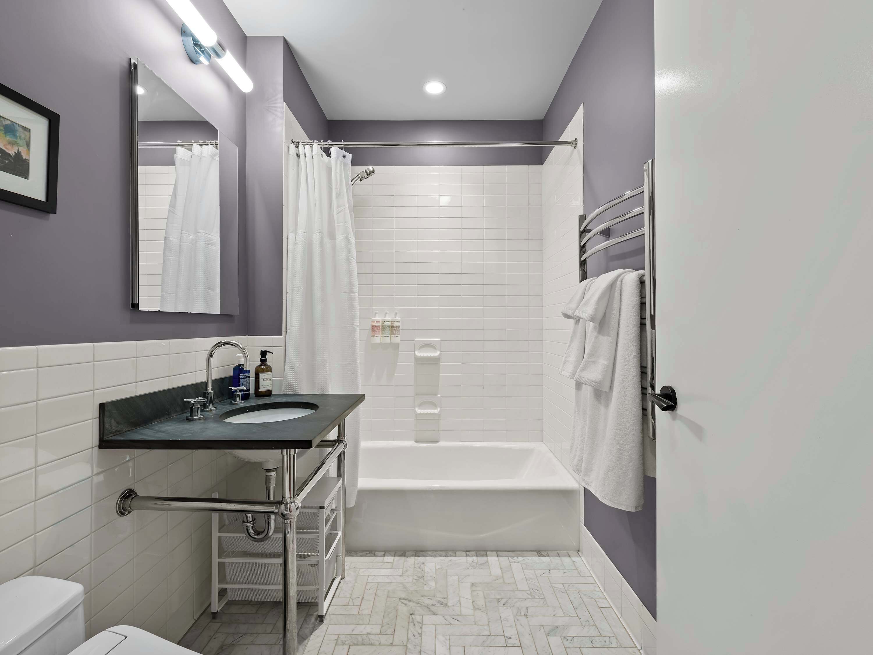 Shower, hair dryer, towels, shampoo