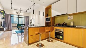 Premium Room, 2 Bedrooms | Private kitchen | Coffee/tea maker, electric kettle