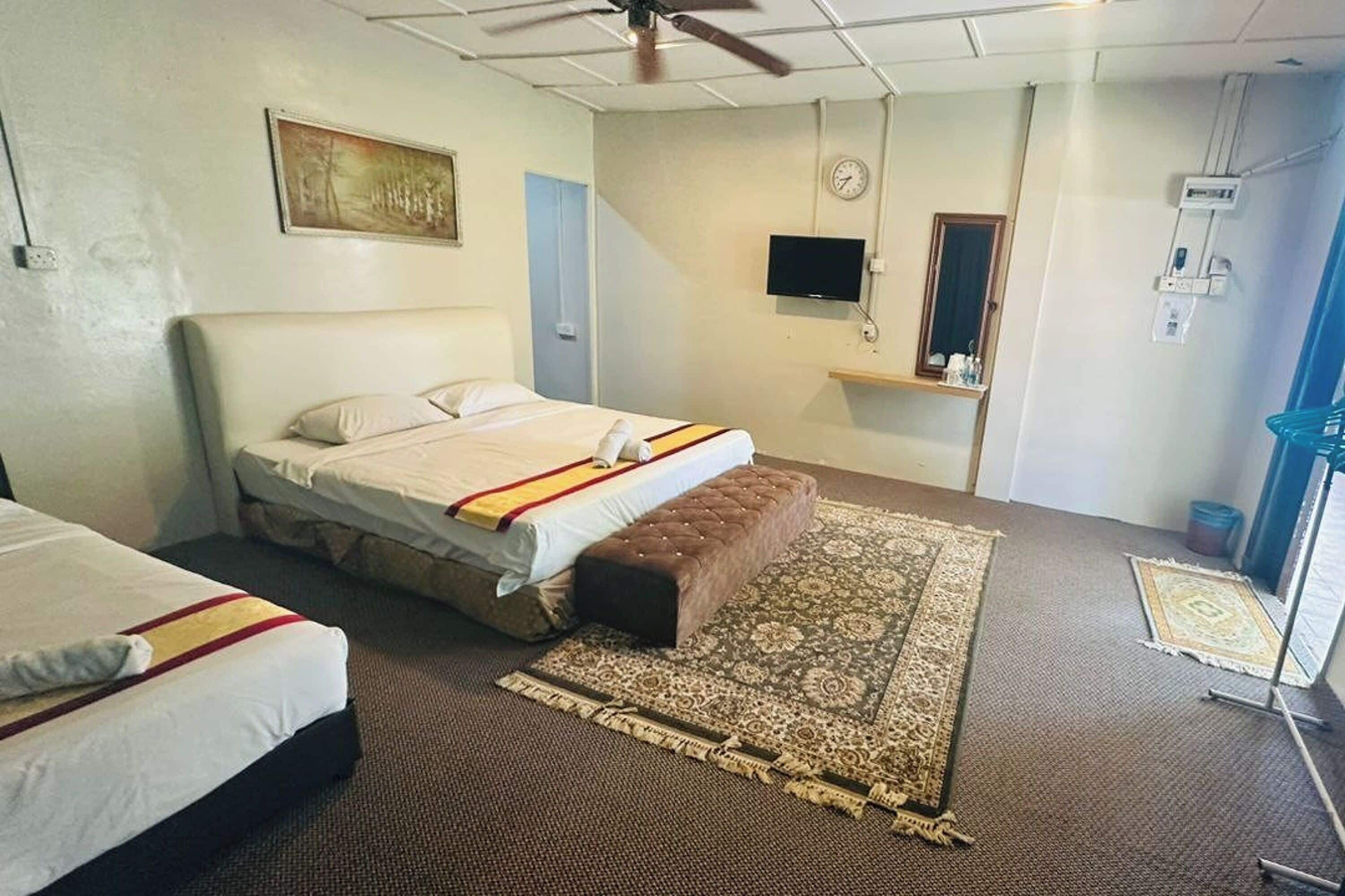 Family Suite (1 King 1 Single with Fridge) | Roupa de cama