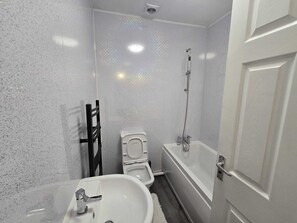 Hair dryer, towels, soap, toilet paper