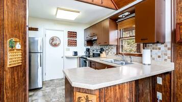 Fridge, microwave, stovetop, coffee/tea maker