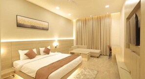 In-room safe, desk, laptop workspace, blackout curtains - THE RIVERSIDE INN (Vidisha)