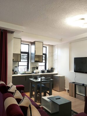 Studio, 1 Bedroom, Balcony | Living room - Modern Cozy Studio in the Heart of Kampala (Kampala)