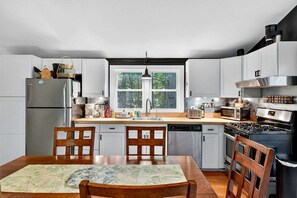 Microwave, stovetop, dishwasher, coffee/tea maker - Cozy Modern Cabin with Fire Pit & Trail Access near Berkeley Springs, West Virginia (Hedgesville)