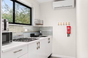 Apartment | Private kitchen | Fridge, microwave, stovetop, electric kettle