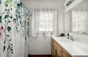 Jetted tub, hair dryer, towels, soap