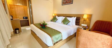 Premium bedding, desk, laptop workspace, free WiFi