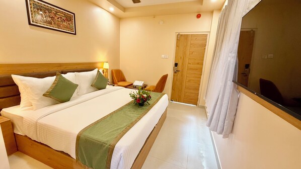 Premium bedding, desk, laptop workspace, free WiFi