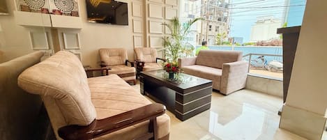 55-inch LED TV with digital channels, fireplace