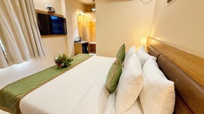 Premium bedding, desk, laptop workspace, free WiFi
